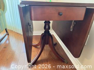 MaxSold Auction: Wood Drop-Leaf Table C - Niagara Falls (Ontario, Canada) Moving Online Auction - January Drive