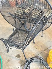 MaxSold Auction: Wrought Iron Patio Table and Chairs Set C - Niagara Falls (Ontario, Canada) Moving Online Auction - January Drive