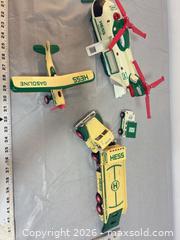 MaxSold Auction: Hess Green & Cream Toy Truck Lot with Detachable Trailer - Ottawa (Ontario, Canada) SELLER MANAGED Commercial Liquidation Online Auction - Grenfell