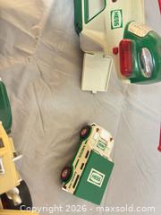 MaxSold Auction: Hess Green & Cream Toy Truck Lot with Detachable Trailer - Ottawa (Ontario, Canada) SELLER MANAGED Commercial Liquidation Online Auction - Grenfell