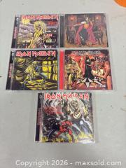 MaxSold Auction: Iron Maiden CD Lot (3-5 Audio CDs) - Ottawa (Ontario, Canada) SELLER MANAGED Commercial Liquidation Online Auction - Grenfell