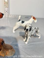 MaxSold Auction: Set of 4 Porcelain Dog Figurines, Medium (3–6 in) - Ottawa (Ontario, Canada) SELLER MANAGED Commercial Liquidation Online Auction - Grenfell