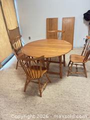 MaxSold Auction: Solid Wood Round Dining Table with 4 Chairs & 2 Leaves - Ottawa (Ontario, Canada) SELLER MANAGED Commercial Liquidation Online Auction - Grenfell