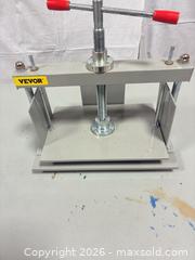 MaxSold Auction: Vevor Steel Paper Press, 12–18 in Width, Gray with Red Handles - Ottawa (Ontario, Canada) SELLER MANAGED Commercial Liquidation Online Auction - Grenfell