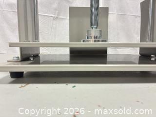 MaxSold Auction: Vevor Steel Paper Press, 12–18 in Width, Gray with Red Handles - Ottawa (Ontario, Canada) SELLER MANAGED Commercial Liquidation Online Auction - Grenfell