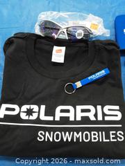 MaxSold Auction: Sunglasses with Polaris Apparel & Accessories Lot — T-Shirt XL, Beanie, Keychain, Koozie - Augusta (Ontario, Canada) SELLER MANAGED Commercial Liquidation Online Auction - Edward Street