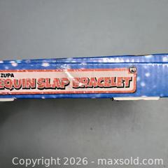 MaxSold Auction: Zupa sequin slap bracket box (24) - Waterford (New Jersey, USA) SELLER MANAGED Downsizing Online Auction - Chew Road (STORAGE)