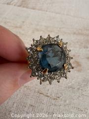 MaxSold Auction: Blue and Clear Rhinestone Cocktail Ring on Gold Tone Setting - Adjustable Size 5, 6, 7 - Kingston (Ontario, Canada) SELLER MANAGED Downsizing Online Auction - Bishop Street