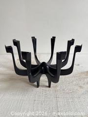 MaxSold Auction: Eight Arm Thin Candlestick Holder by Gunnar Cyren for Dansk Designs - MCM Black Cast Metal Candelabra - Made in Denmark - Kingston (Ontario, Canada) SELLER MANAGED Downsizing Online Auction - Bishop Street