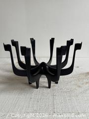 MaxSold Auction: Eight Arm Thin Candlestick Holder by Gunnar Cyren for Dansk Designs - MCM Black Cast Metal Candelabra - Made in Denmark - Kingston (Ontario, Canada) SELLER MANAGED Downsizing Online Auction - Bishop Street