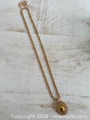 MaxSold Auction: Gold Tone Long Necklace with Letter L Pendant Surrounded by Clear Rhinestones - Kingston (Ontario, Canada) SELLER MANAGED Downsizing Online Auction - Bishop Street