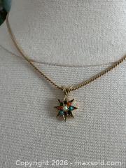 MaxSold Auction: Gold Tone Petit Necklace with Colourful Bead Star Pendant - Kingston (Ontario, Canada) SELLER MANAGED Downsizing Online Auction - Bishop Street