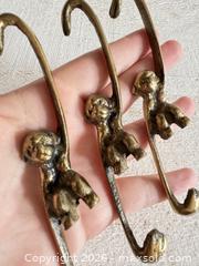 MaxSold Auction: Set of Three Vintage Metal Monkey Hanging Hooks - Monkey Chain Hooks - Kingston (Ontario, Canada) SELLER MANAGED Downsizing Online Auction - Bishop Street