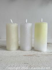MaxSold Auction: Set of Three Waxed Plastic Faux Pillar Candles - Battery Operated Candles  - Kingston (Ontario, Canada) SELLER MANAGED Downsizing Online Auction - Bishop Street