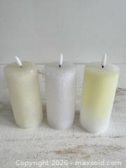MaxSold Auction: Set of Three Waxed Plastic Faux Pillar Candles - Battery Operated Candles  - Kingston (Ontario, Canada) SELLER MANAGED Downsizing Online Auction - Bishop Street