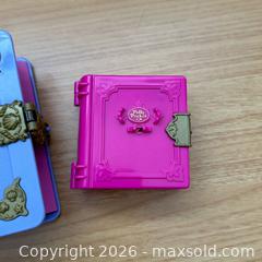 MaxSold Auction: Two Vintage Polly Pocket Book Compacts  - Kingston (Ontario, Canada) SELLER MANAGED Downsizing Online Auction - Bishop Street