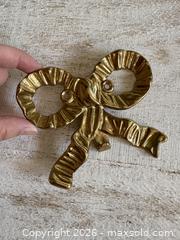 MaxSold Auction: Vintage Brass Bow Hook - Single Brass Wall Mounted Bow Hook - Kingston (Ontario, Canada) SELLER MANAGED Downsizing Online Auction - Bishop Street