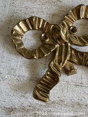 MaxSold Auction: Vintage Brass Bow Hook - Single Brass Wall Mounted Bow Hook - Kingston (Ontario, Canada) SELLER MANAGED Downsizing Online Auction - Bishop Street