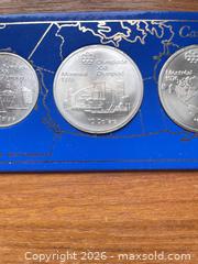 MaxSold Auction: Canada Montreal Olympics Silver Coin Set - Ottawa (Ontario, Canada) SELLER MANAGED Downsizing Online Auction - Grove Avenue