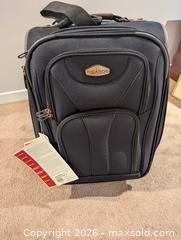 MaxSold Auction: Ricardo Black Softside Carry-On Suitcase, 2-Wheel - Ajax (Ontario, Canada) SELLER MANAGED Downsizing Online Auction - Meekings Drive