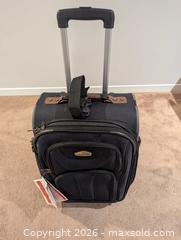 MaxSold Auction: Ricardo Black Softside Carry-On Suitcase, 2-Wheel - Ajax (Ontario, Canada) SELLER MANAGED Downsizing Online Auction - Meekings Drive