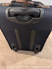 MaxSold Auction: Ricardo Black Softside Carry-On Suitcase, 2-Wheel - Ajax (Ontario, Canada) SELLER MANAGED Downsizing Online Auction - Meekings Drive
