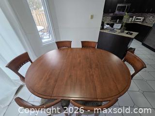 MaxSold Auction: Solid Wood Oval Dining Table Set, Medium Brown, Seats 6 - Ajax (Ontario, Canada) SELLER MANAGED Downsizing Online Auction - Meekings Drive