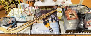 MaxSold Auction: Lot of Hockey Sticks, Tennis Rackets, Boxed Cheers Dart Game & Collectibles B - Kingston (Massachusetts, USA) PARTNER MANAGED Estate Sale Online Auction - Grove Street