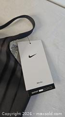 MaxSold Auction: Nike One Women's Sports Bra - Riverview (Florida, USA) SELLER MANAGED Downsizing Online Auction - Holly Heath Drive