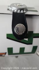 MaxSold Auction: Prezzo Florida License Plate Purse  - Riverview (Florida, USA) SELLER MANAGED Downsizing Online Auction - Holly Heath Drive