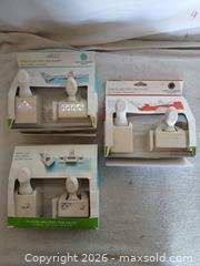 MaxSold Auction: Martha Stewart "Punch Around the Page" Sets - Laurel Leaf, Double Loops, Poinsettia - Sun City (Arizona, USA) SELLER MANAGED Reseller Online Auction - West Forrester Drive