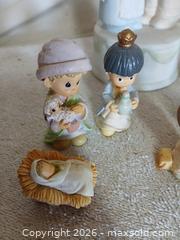 MaxSold Auction: Precious Moments "Sealed with A Kiss" Wedding Cake Topper – Bisque Porcelain and Precious Moments Nativity collection. - Sun City (Arizona, USA) SELLER MANAGED Reseller Online Auction - West Forrester Drive