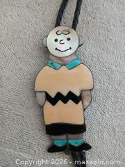 MaxSold Auction: Vintage Zuni Sterling Silver "Charlie Brown" Mosaic Inlay Bolo Tie - Sun City (Arizona, USA) SELLER MANAGED Reseller Online Auction - West Forrester Drive