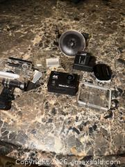 MaxSold Auction: DRAGON TOUCH VISION 3 4K ULTRA HD ACTION CAMERA WITH MICRO SD CARDS  - Warwick Township (Pennsylvania, USA) SELLER MANAGED Estate Sale Online Auction - Crocker Lane