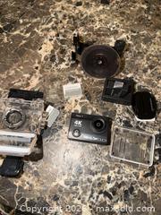 MaxSold Auction: DRAGON TOUCH VISION 3 4K ULTRA HD ACTION CAMERA WITH MICRO SD CARDS  - Warwick Township (Pennsylvania, USA) SELLER MANAGED Estate Sale Online Auction - Crocker Lane