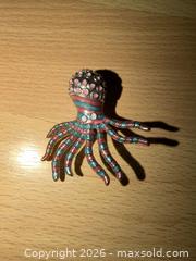MaxSold Auction: RARE UNIQUE 1.5” PINK & GREEN OCTOPUS SILVER TONE BROOCH PIN - Warwick Township (Pennsylvania, USA) SELLER MANAGED Estate Sale Online Auction - Crocker Lane