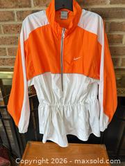 MaxSold Auction: RARE VINTAGE NIKE LADIES XL WHITE & ORANGE LONG WINDBREAKER WITH CINCH   - Warwick Township (Pennsylvania, USA) SELLER MANAGED Estate Sale Online Auction - Crocker Lane