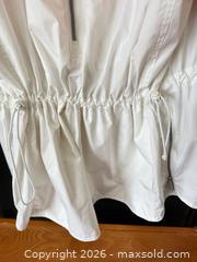 MaxSold Auction: RARE VINTAGE NIKE LADIES XL WHITE & ORANGE LONG WINDBREAKER WITH CINCH   - Warwick Township (Pennsylvania, USA) SELLER MANAGED Estate Sale Online Auction - Crocker Lane