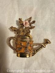 MaxSold Auction: VINTAGE 1.85” GOLD TONE & BROWN WATERING CAN WITH FLOWERS BROOCH PIN - Warwick Township (Pennsylvania, USA) SELLER MANAGED Estate Sale Online Auction - Crocker Lane