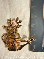 MaxSold Auction: VINTAGE 1.85” GOLD TONE & BROWN WATERING CAN WITH FLOWERS BROOCH PIN - Warwick Township (Pennsylvania, USA) SELLER MANAGED Estate Sale Online Auction - Crocker Lane