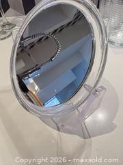 MaxSold Auction: Clear Small Double-Sided Wall-Mount Makeup Mirror - Toronto (Ontario, Canada) SELLER MANAGED Downsizing Online Auction - Poplar Plains Road