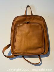MaxSold Auction: Two Leather Backpack + Travel Bags in Brown + Black - Toronto (Ontario, Canada) PARTNER MANAGED Estate Sale Online Auction - La Rose Avenue