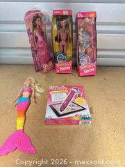 MaxSold Auction: 1980s Barbie Dolls Lot of 3 NIB + 1 Loose Mermaid + 1  Fashion Creator Pen NIB digi-art - Los Angeles (California, USA) SELLER MANAGED Estate Sale Online Auction -  Troost Avenue (STORAGE)
