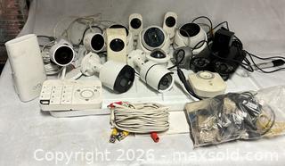 MaxSold Auction: Lot of 21 Items 17 Security Cameras 2 Hubs 1 wire extension and a bag of all adapters  - Los Angeles (California, USA) SELLER MANAGED Estate Sale Online Auction -  Troost Avenue (STORAGE)