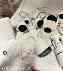 MaxSold Auction: Lot of 21 Items 17 Security Cameras 2 Hubs 1 wire extension and a bag of all adapters  - Los Angeles (California, USA) SELLER MANAGED Estate Sale Online Auction -  Troost Avenue (STORAGE)