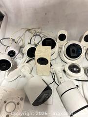 MaxSold Auction: Lot of 21 Items 17 Security Cameras 2 Hubs 1 wire extension and a bag of all adapters  - Los Angeles (California, USA) SELLER MANAGED Estate Sale Online Auction -  Troost Avenue (STORAGE)