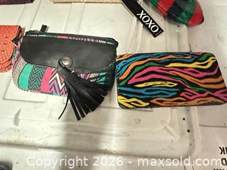 MaxSold Auction: Lot of 8 Assorted Women’s Wallets - Los Angeles (California, USA) SELLER MANAGED Estate Sale Online Auction -  Troost Avenue (STORAGE)