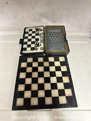 MaxSold Auction: NOVAG VIP CHESS TRAINER AND MARBLE CHESS BOARD - Los Angeles (California, USA) SELLER MANAGED Estate Sale Online Auction -  Troost Avenue (STORAGE)