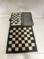 MaxSold Auction: NOVAG VIP CHESS TRAINER AND MARBLE CHESS BOARD - Los Angeles (California, USA) SELLER MANAGED Estate Sale Online Auction -  Troost Avenue (STORAGE)