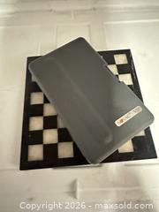 MaxSold Auction: NOVAG VIP CHESS TRAINER AND MARBLE CHESS BOARD - Los Angeles (California, USA) SELLER MANAGED Estate Sale Online Auction -  Troost Avenue (STORAGE)